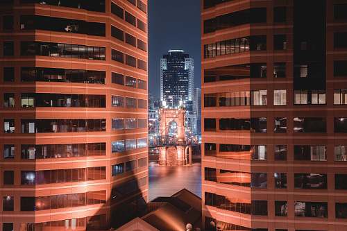 high rise lighted buildings urban